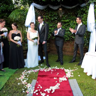 Celebrant with bride and Groom